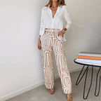 Torvella | Pantaloni da donna con gamba larga e motivo geometrico